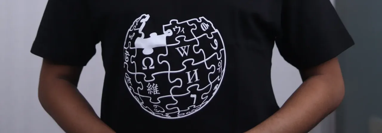 Wikipedian wearing a Wikipedia logo printed t-shirt
